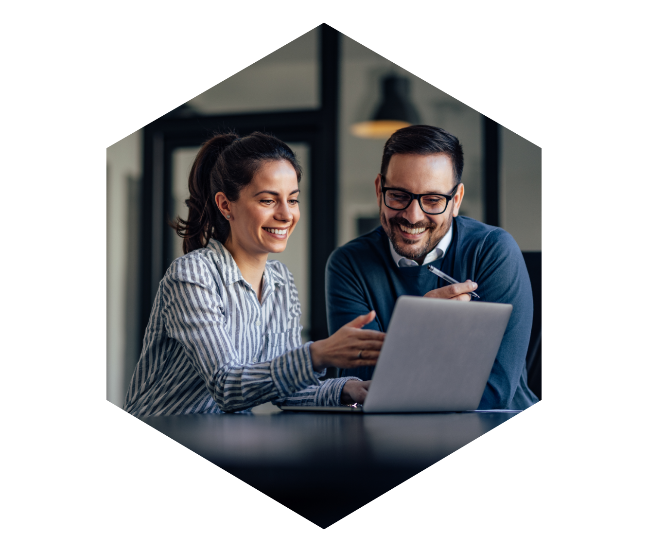 man and woman at a computer